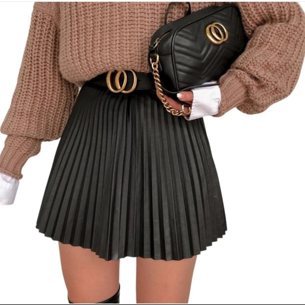 J. Crew faux leather pleated skirt. Dress up or down❣️ perfect for night out